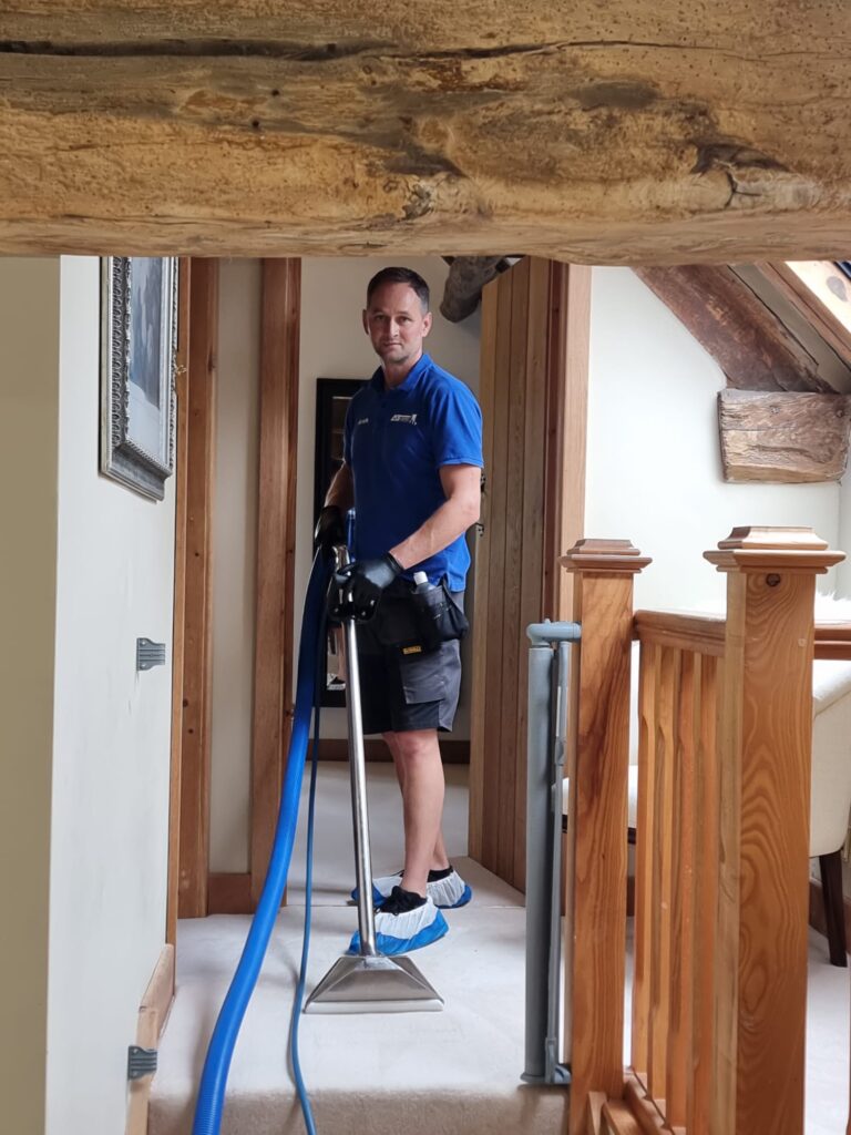 AG CARPET SPECIALIST (2) Carpet cleaning on a landing under exposed oak beams in a Cotswold barn conversion